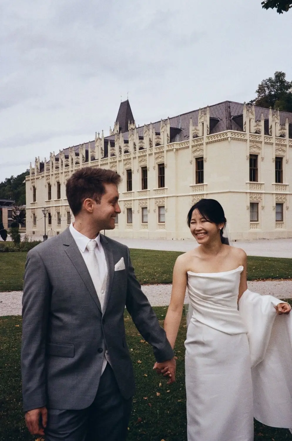 Bride and groom in front of Schloss Hernstein, on 35mm film