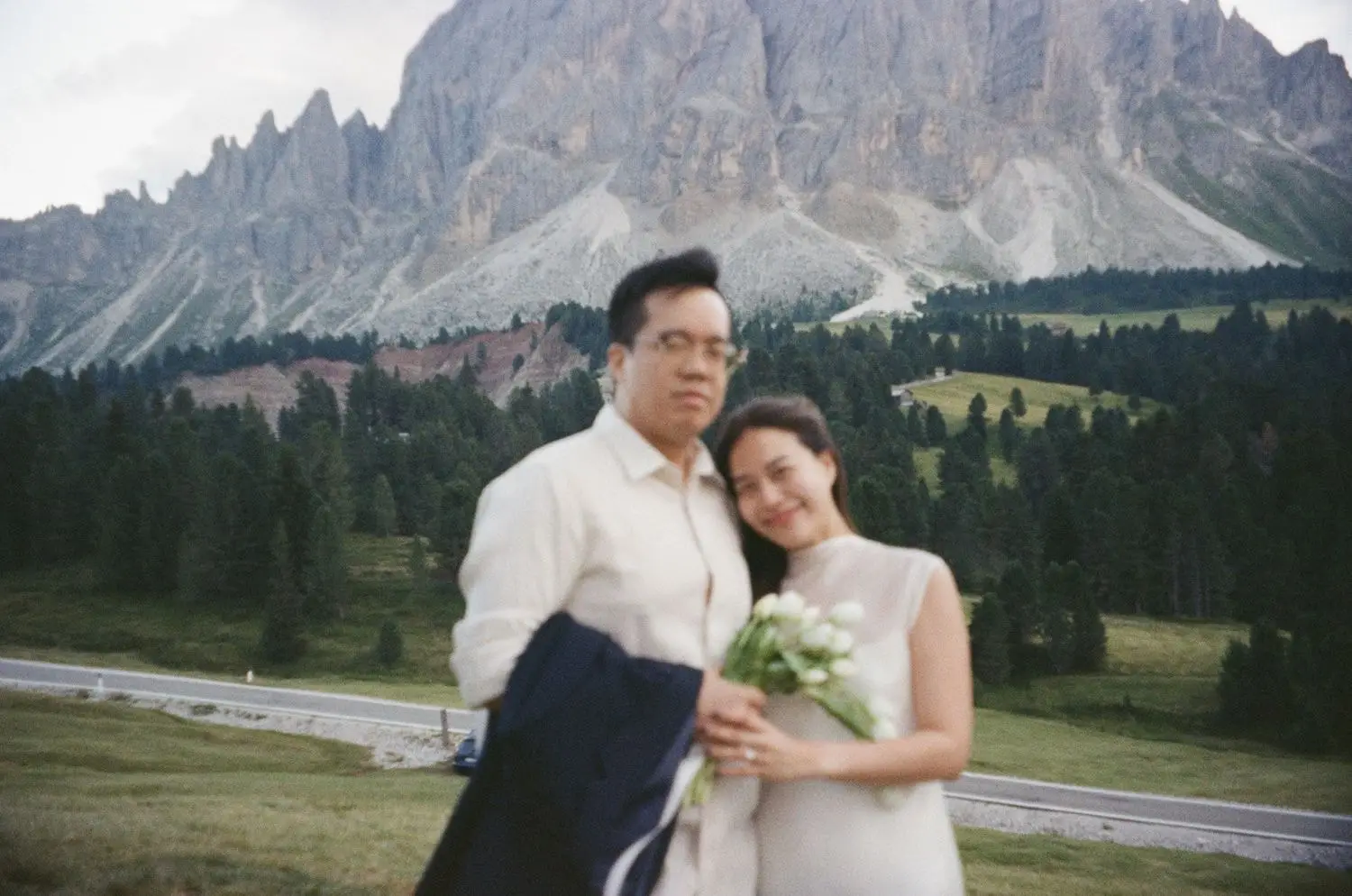Newly engaged couple below the Dolomites peaks, on 35mm film