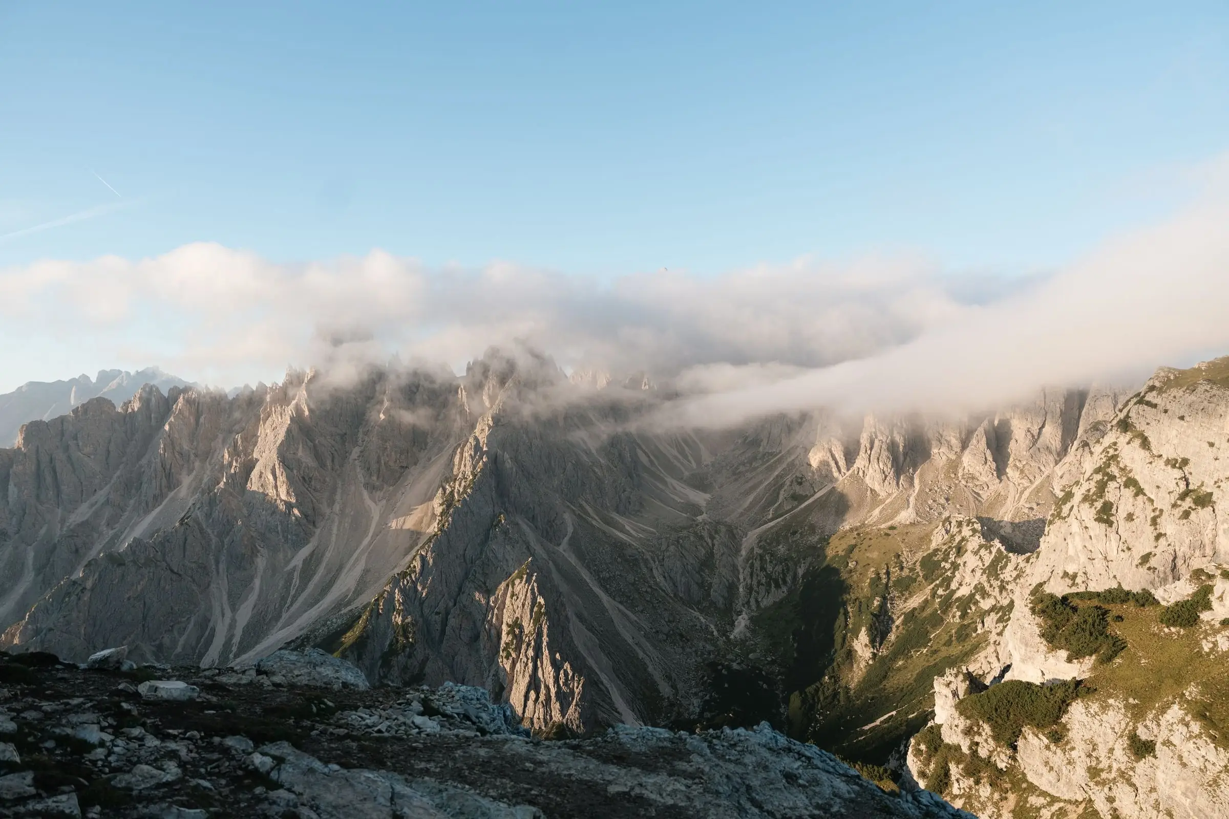 Clouds drifting over the Cadini di Misurina towers in the morning