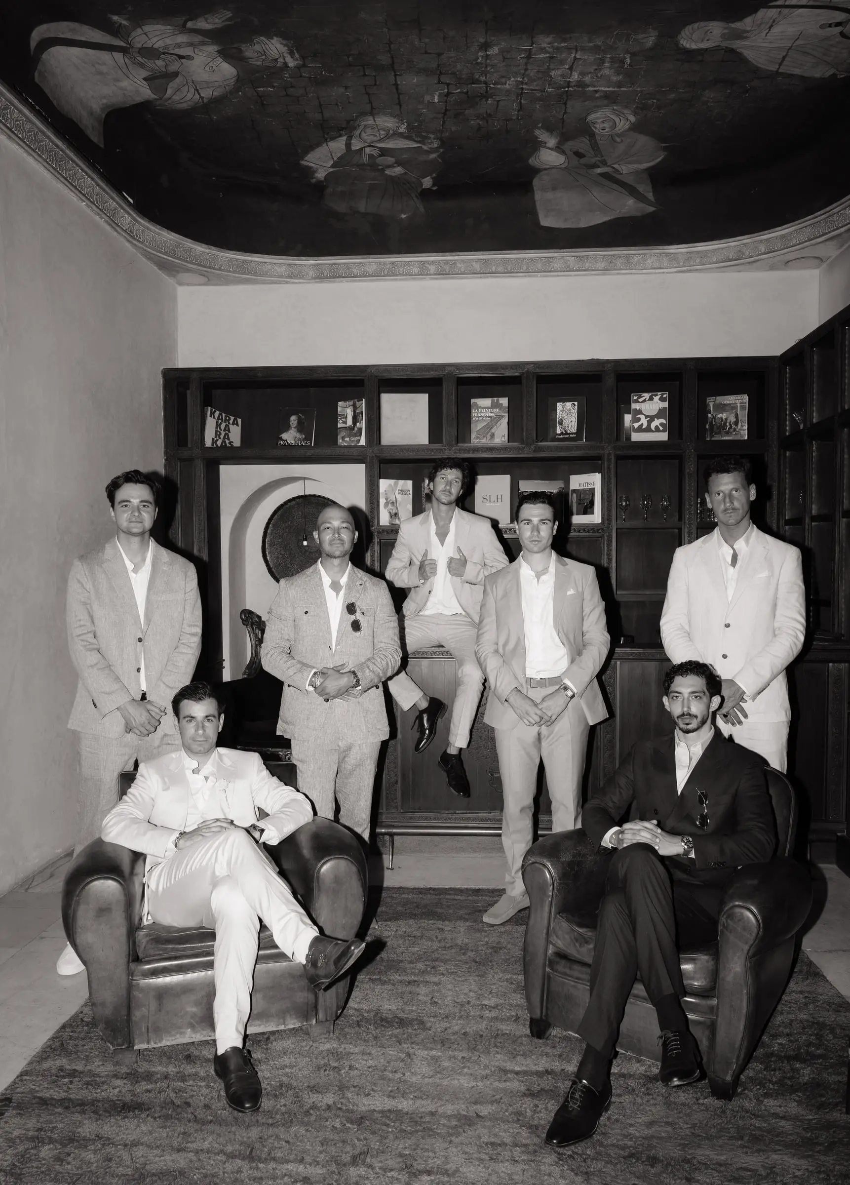 Black and white group photo of the groom and his groomsmen