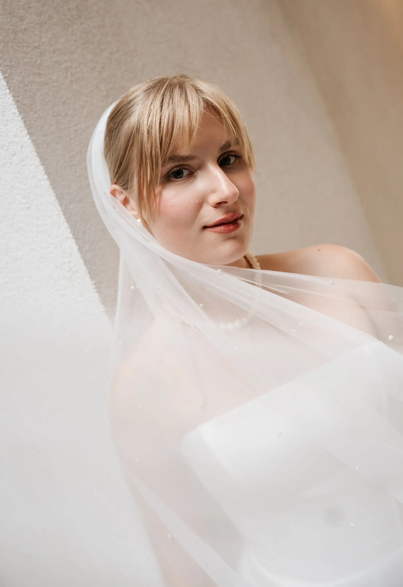 Portrait of the bride under her veil
