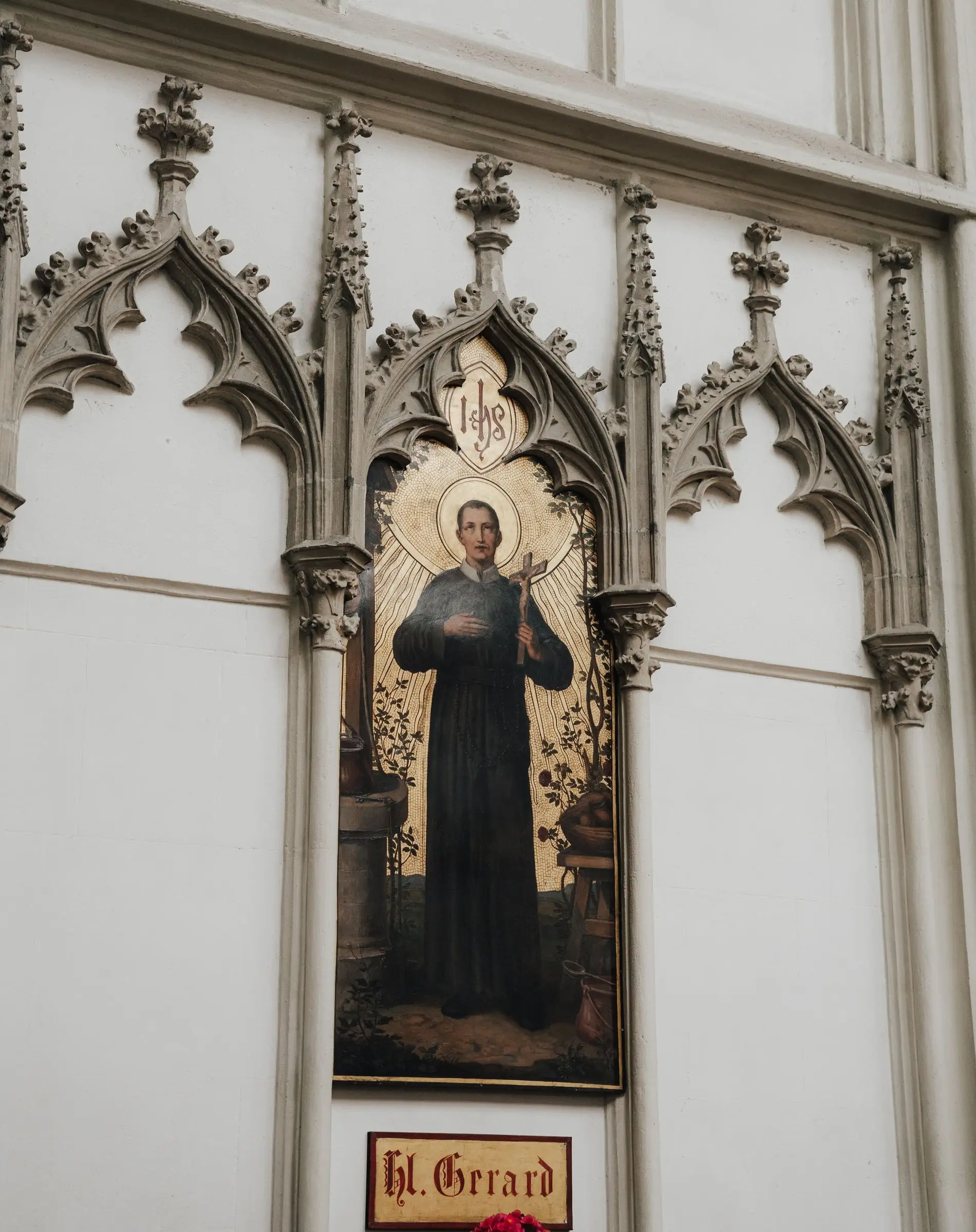 Gothic wall painting of a saint inside Maria am Gestade