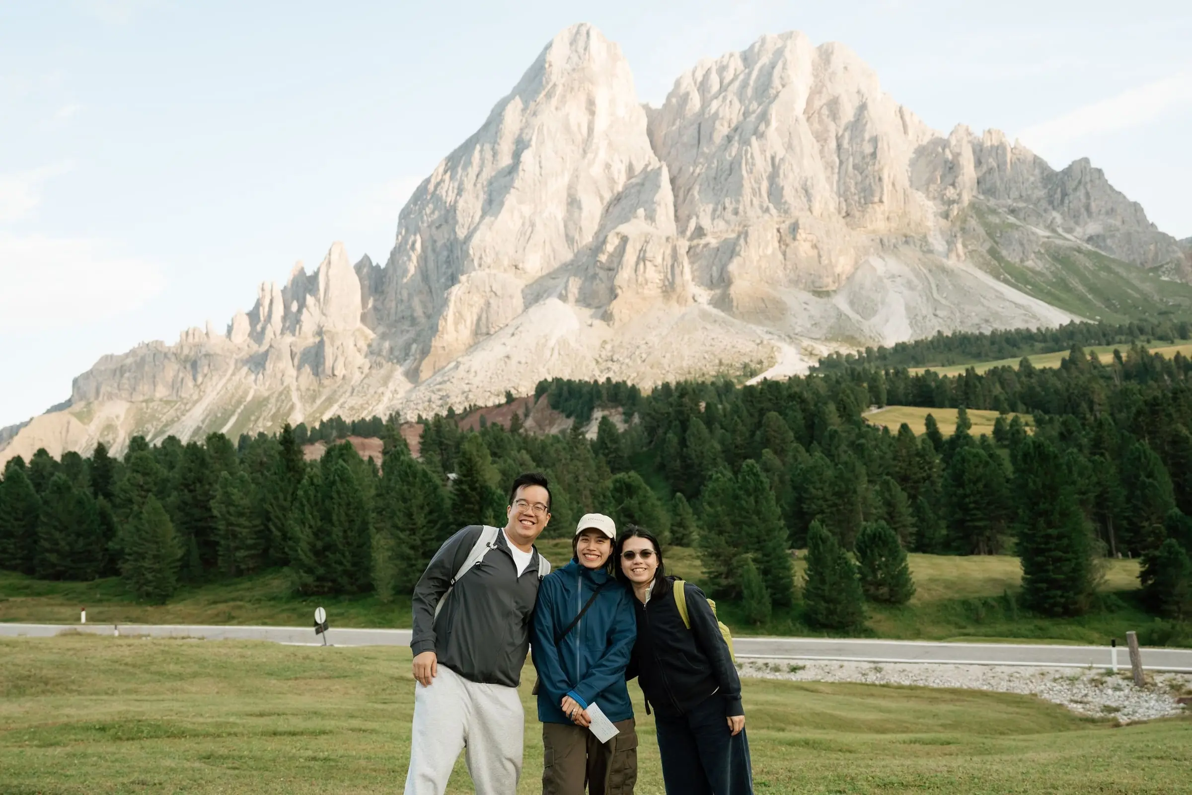 The newly engaged couple and a friend in front of the Sass de Putia