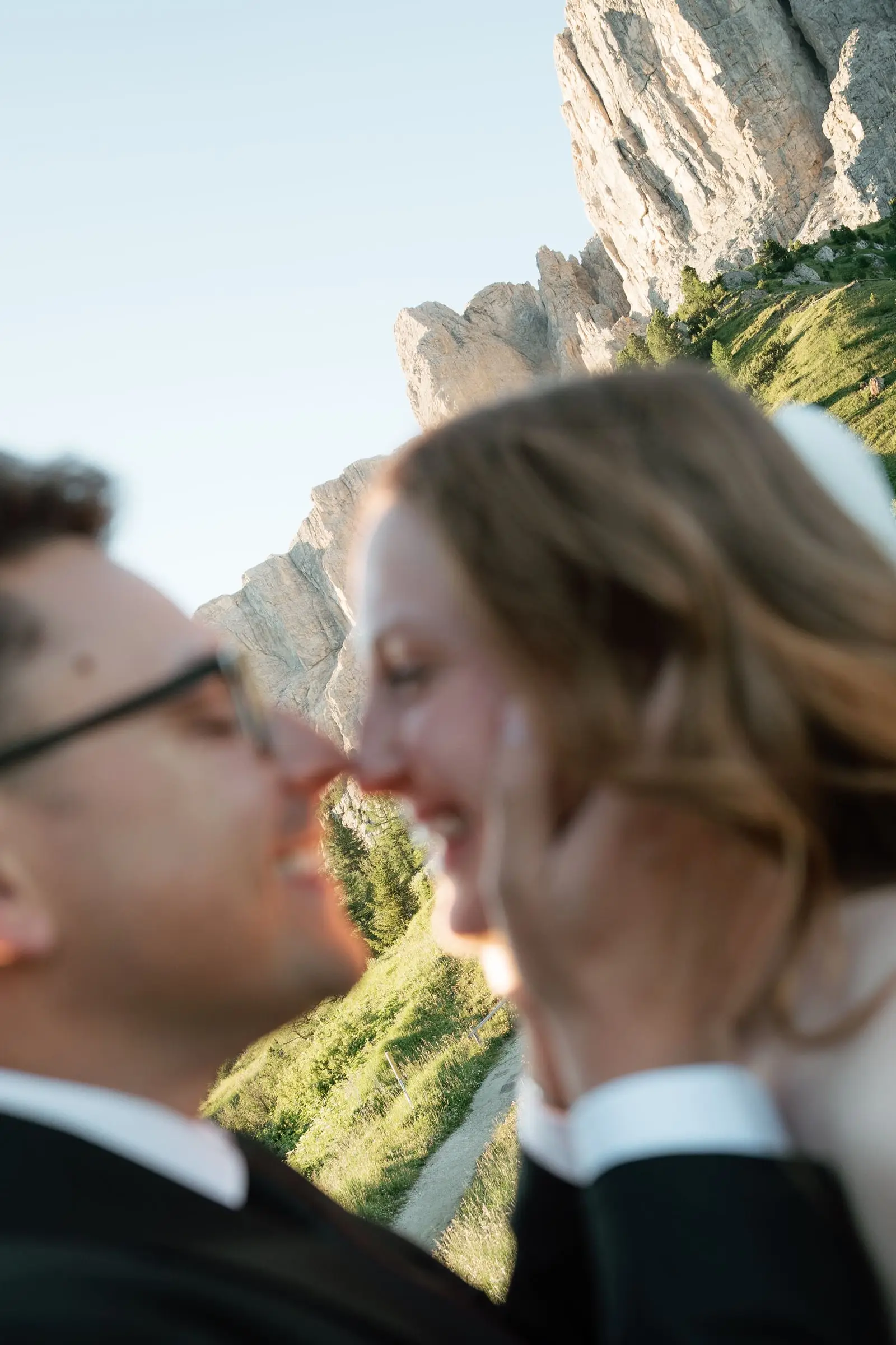Close-up of the couple laughing nose to nose